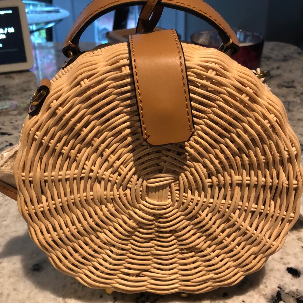 Etienne Aigner straw and leather handbag.